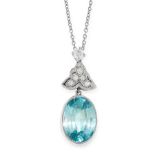 AN AQUAMARINE AND DIAMOND PENDANT AND CHAIN in platinum, the pendant set with an oval cut aquamarine