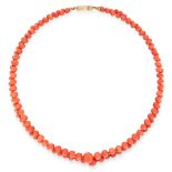 A CORAL BEAD NECKLACE in 18ct yellow gold, comprising two rows of one hundred and fifty one