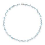 AN AQUAMARINE NECKLACE in 18ct white gold, comprising a single row of forty-four marquise, pear