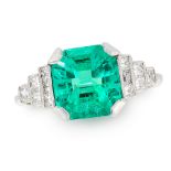 A COLOMBIAN EMERALD AND DIAMOND RING set with an emerald cut emerald of 2.82 carats between