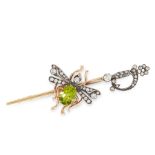 A PERIDOT AND DIAMOND INSECT BROOCH in yellow gold and silver, designed as a sword, the hilt set