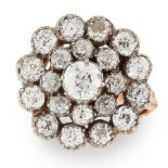 AN ANTIQUE DIAMOND CLUSTER RING, LATE 19TH CENTURY in yellow gold and silver, set with a central old