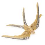 A DIAMOND SWALLOW BROOCH in high carat yellow gold, designed as a swallow in flight, set with rose