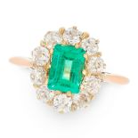 A COLOMBIAN EMERALD AND DIAMOND RING in high carat yellow gold, set with an emerald cut emerald of
