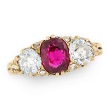 AN ANTIQUE RUBY AND DIAMOND DRESS RING in 18ct yellow gold, set with a cushion cut ruby between