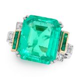 A COLOMBIAN EMERALD AND DIAMOND RING in 18ct white gold, set with an emerald cut emerald of accented