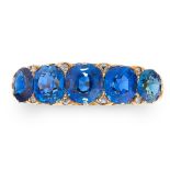 AN ANTIQUE BURMA NO HEAT SAPPHIRE AND DIAMOND RING in 18ct yellow gold, set with a row of five