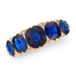 AN ANTIQUE UNHEATED SAPPHIRE AND DIAMOND RING, LATE 19TH CENTURY in 18ct yellow gold, set with a row