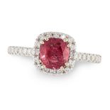 A RUBY AND DIAMOND DRESS RING in 18ct white gold, set with a cushion cut ruby of 1.15 carats