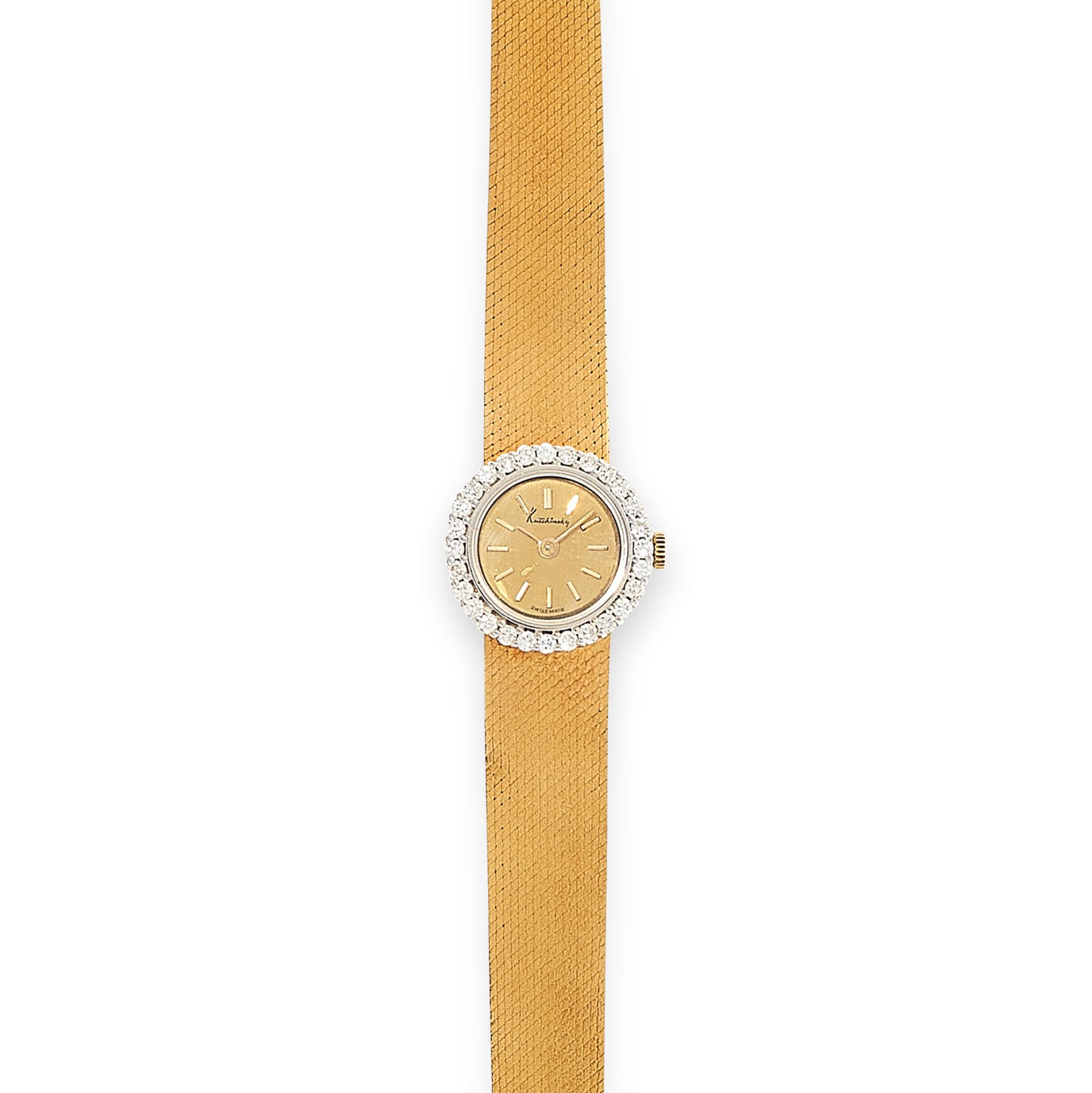 A VINTAGE DIAMOND WRIST WATCH, KUTCHINSKY 1971 in 18ct yellow gold, the circular face within a