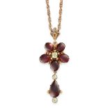 AN ANTIQUE GARNET AND PASTE PENDANT AND CHAIN, 19TH CENTURY in yellow gold, designed as a flower,