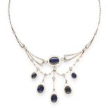 A SAPPHIRE AND DIAMOND NECKLACE, EARLY 20TH CENTURY set with a central oval cut sapphires within a