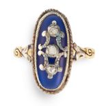 AN ANTIQUE DIAMOND AND BLUE GLASS BAGUE DE FIRMAMENT RING in yellow gold and silver, the oval face