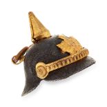 AN ANTIQUE PICKELHAUBE HELMET PENDANT / CHARM designed as the helmet of a Russian officer, with a