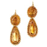 A PAIR OF ANTIQUE CITRINE EARRINGS, 19TH CENTURY in high carat yellow gold, each set with an oval