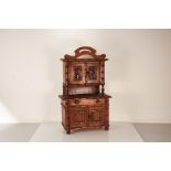 A mid- 20th century stained wood miniature or ‘apprentice’ dresser, circa 1950