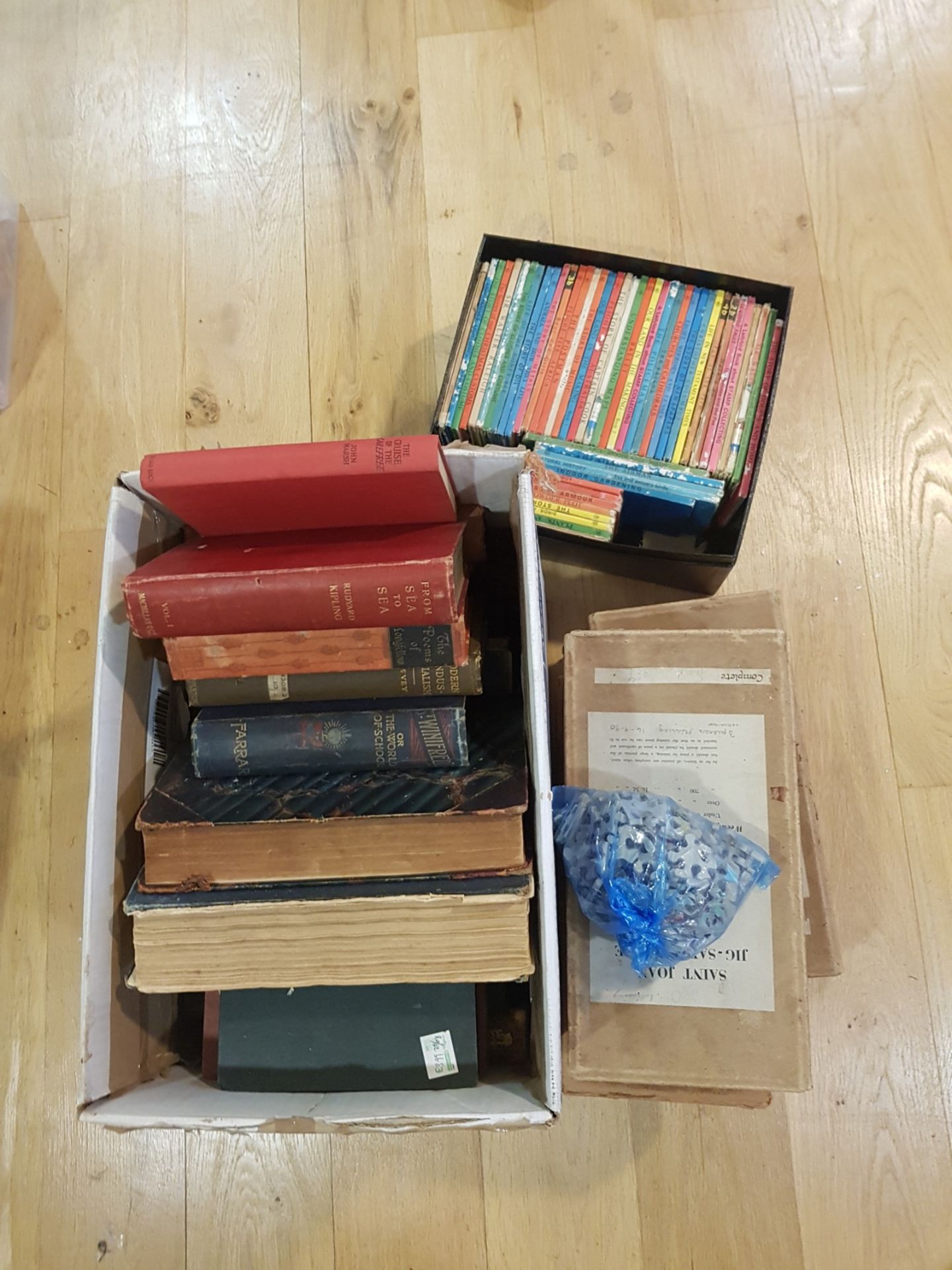 A MIXED BOX OF VARIOUS BOOKS AND JIGSAW PUZZLES