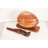 A mid-20th century carved teak novelty nut box, circa 1965