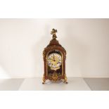 A 19th century French tortoiseshell and gilt bronze mounted Boulle style bracket clock, circa 1860