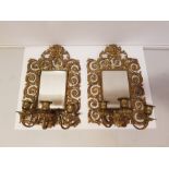 A pair of 20th century gilt brass girandole mirrors