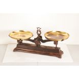 A 20th century set of cast iron weighing scales, probably American