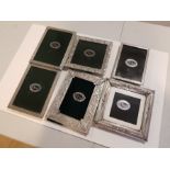 A selection of modern pewter photograph frames by Elias