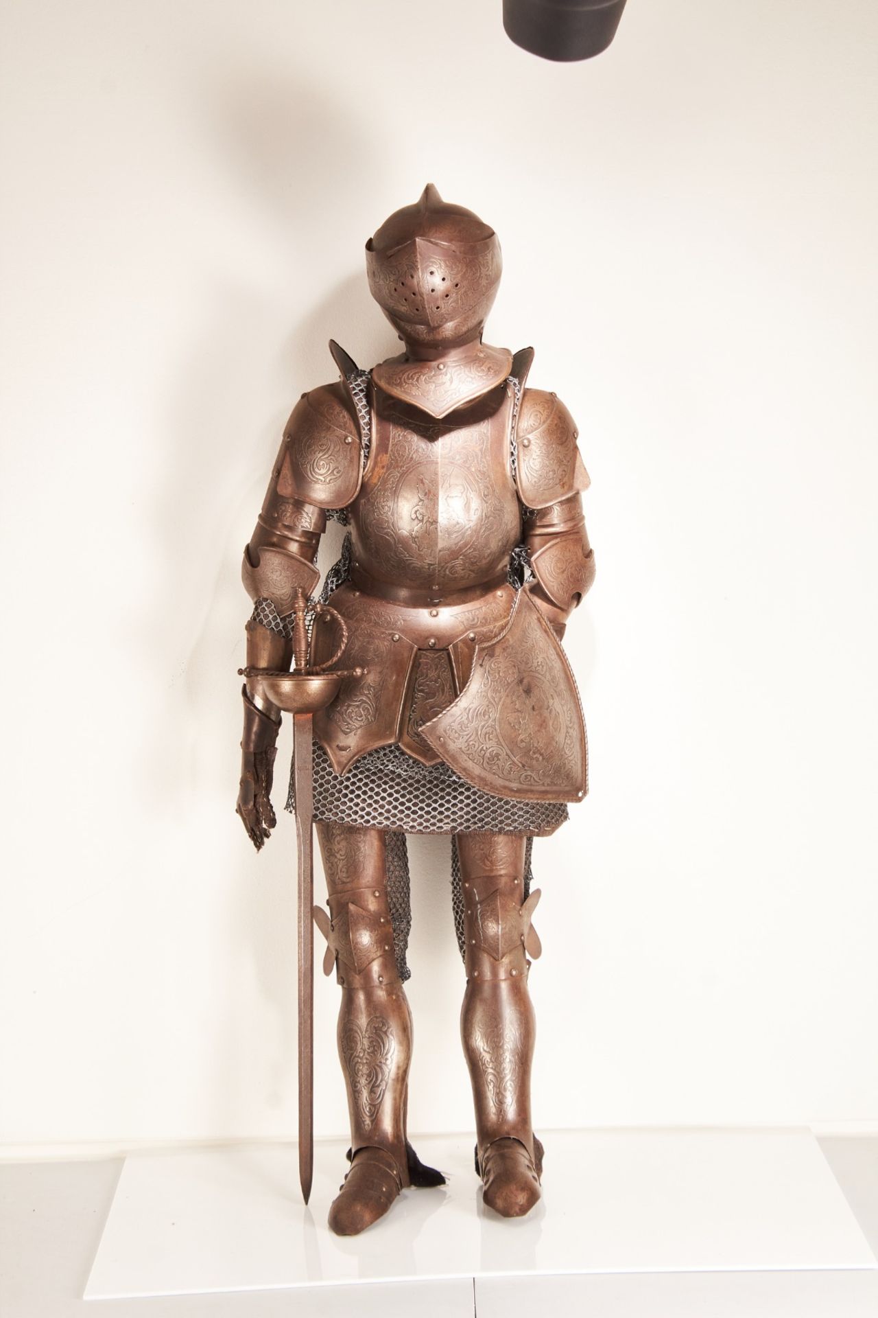 A 20th century etched steel model of a suit of armour