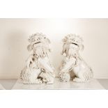 A pair of late-20th century Chinese porcelain blanc-de-chine Foo dogs or lion dog