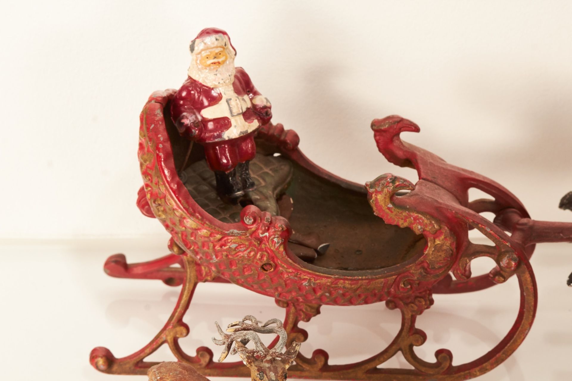 A mid-20th century die-cast model of Santa’s sleigh and two reindeer - Image 2 of 2