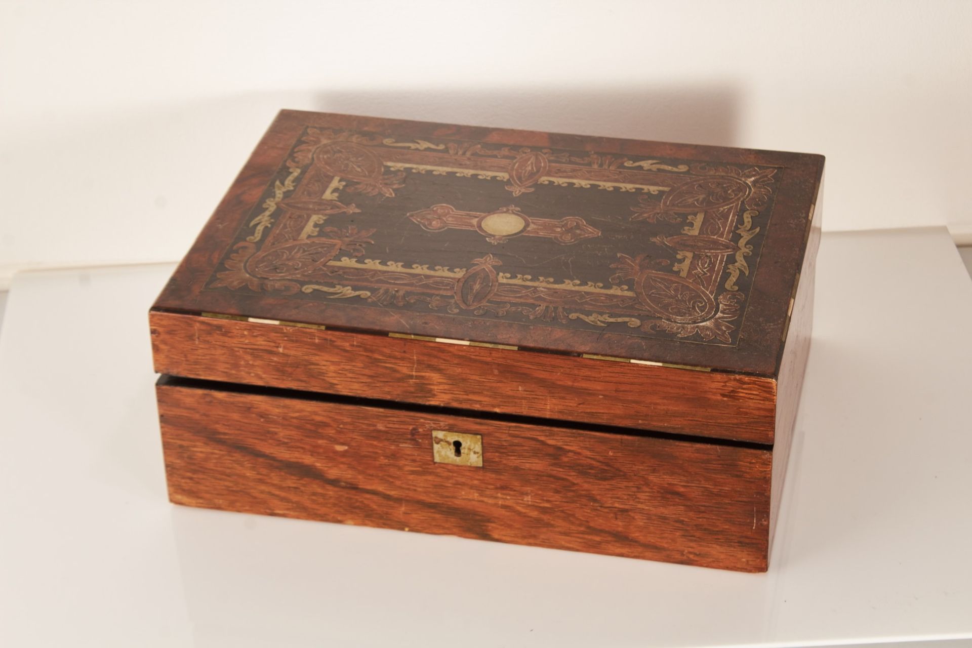 A late 19th century Victorian inlaid oak writing slope circa 1880