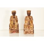 Two parcel gilt painted wooden Chinese figures of saints