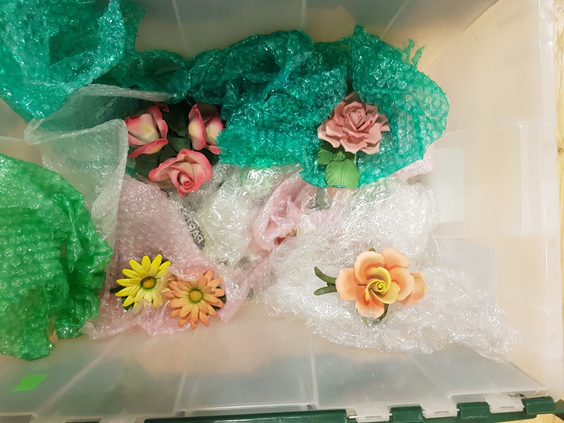 A BOX OF VARIOUS CERAMIC FLOWER MODELS AF