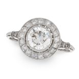 A DIAMOND DRESS RING set with a central round cut diamond of 1.32 carats within a border of