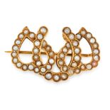 AN ANTIQUE PEARL BROOCH, 19TH CENTURY in high carat yellow gold, designed as a horseshoe interlocked