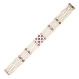 A PEARL, RUBY AND DIAMOND CHOKER NECKLACE in 18ct yellow gold and platinum, comprising six rows of