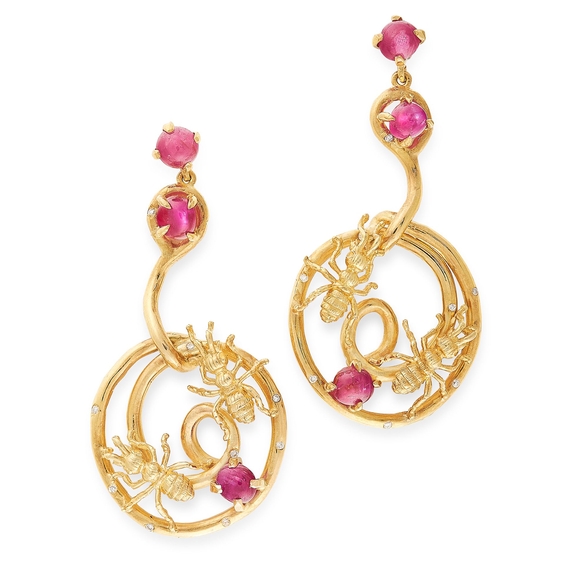 A PAIR OF VINTAGE RUBY AND DIAMOND EARRINGS in 18ct yellow gold, each designed as a scrolling