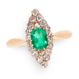 AN EMERALD AND DIAMOND DRESS RING, EARLY 20TH CENTURY in yellow gold, set with an emerald cut