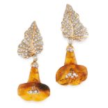 A PAIR OF DIAMOND AND AMBER FLOWER EARRINGS in yellow gold, in the form of a leaf set with round cut