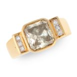 A COLOURED DIAMOND AND WHITE DIAMOND DRESS RING in 18ct yellow gold, set with a central radiant