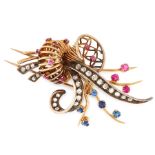 A VINTAGE RUBY, SAPPHIRE AND DIAMOND BASKET BROOCH in yellow gold and silver, designed as a spray of