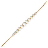 AN ANTIQUE MOONSTONE BRACELET, CIRCA 1900 in yellow gold, comprising a row of eleven graduated