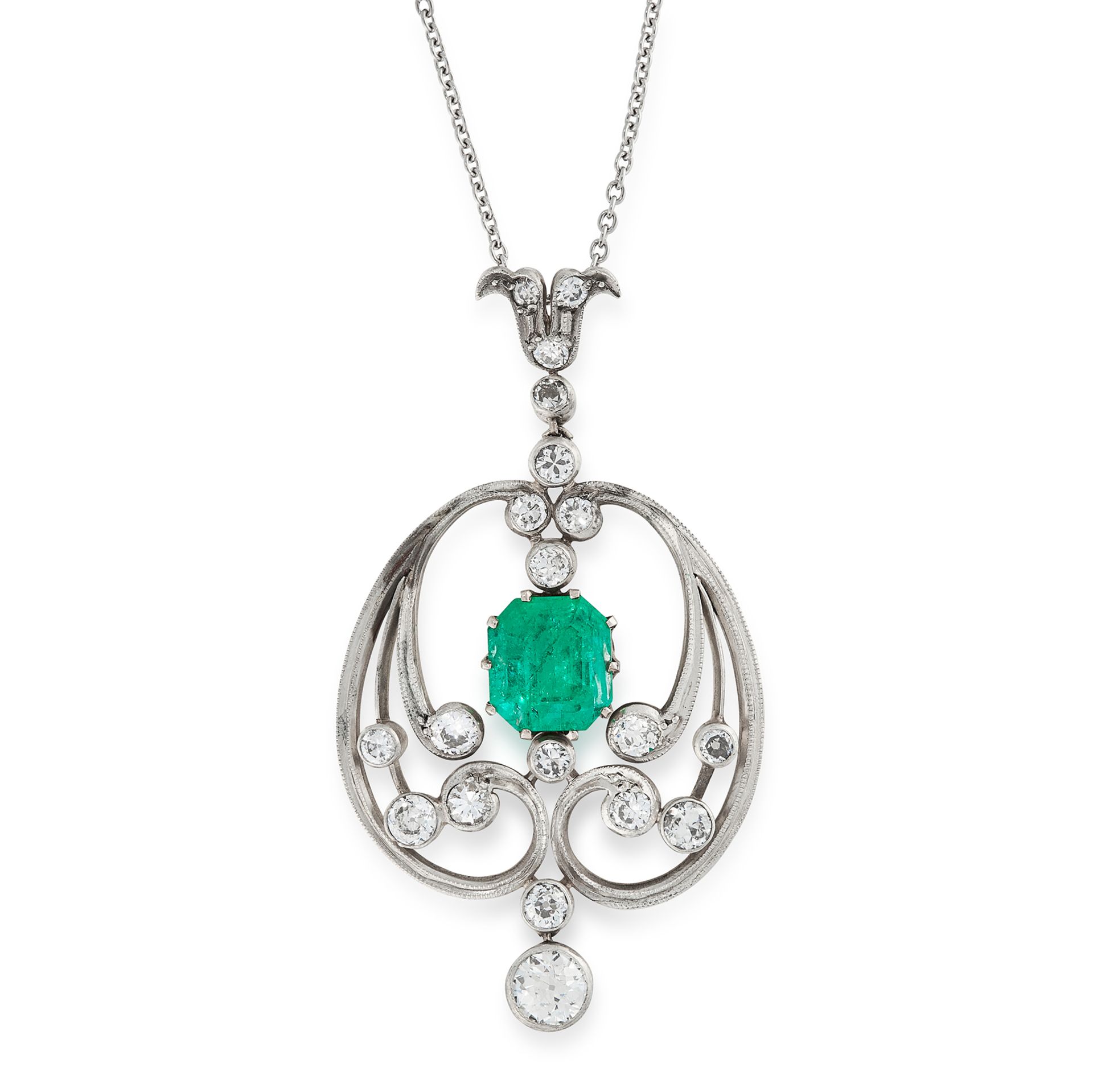 AN EMERALD AND DIAMOND PENDANT, CIRCA 1900 in yellow gold and silver, set with a central emerald cut