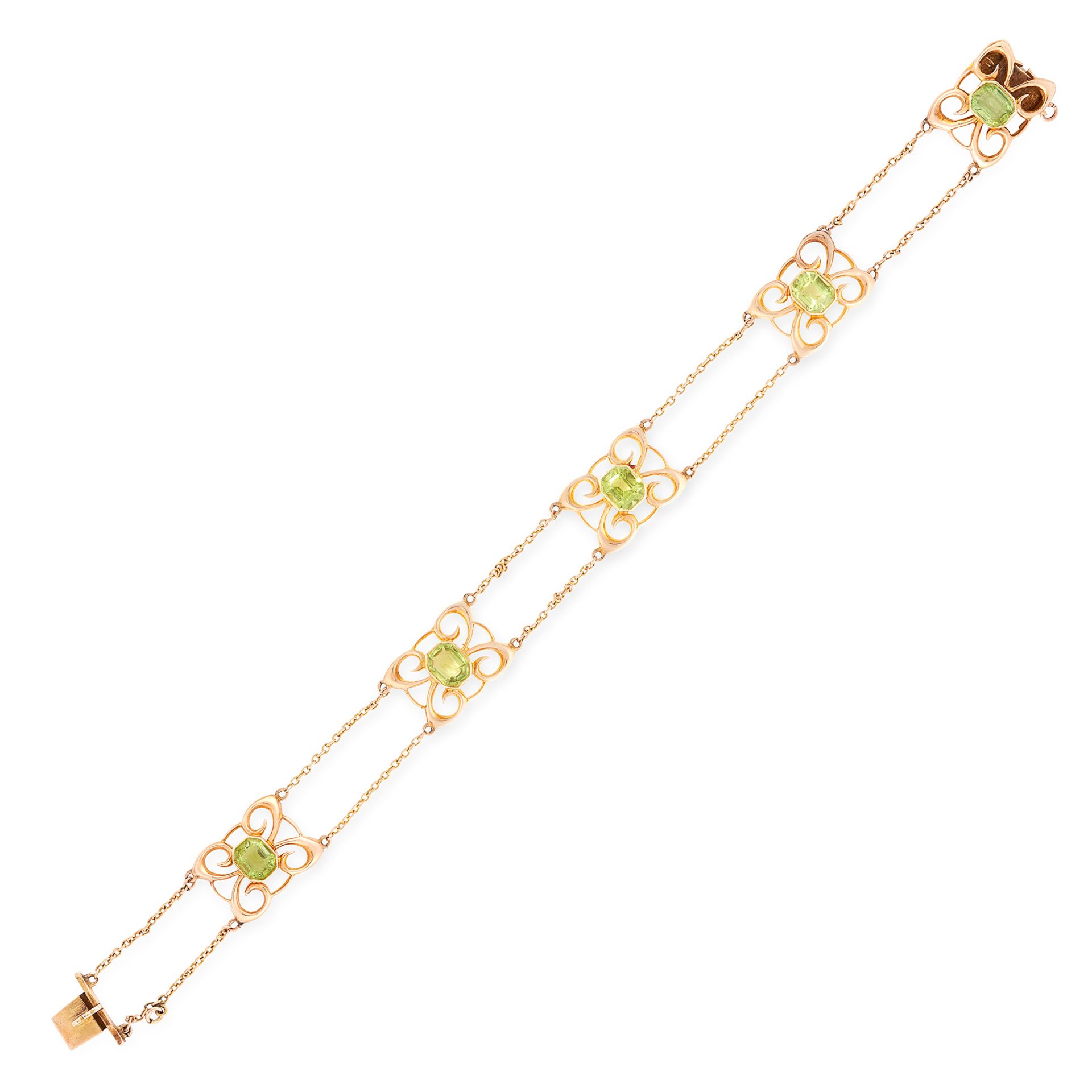 AN ART NOUVEAU PERIDOT BRACELET, EARLY 20TH CENTURY in 15ct yellow gold, set with five emerald cut