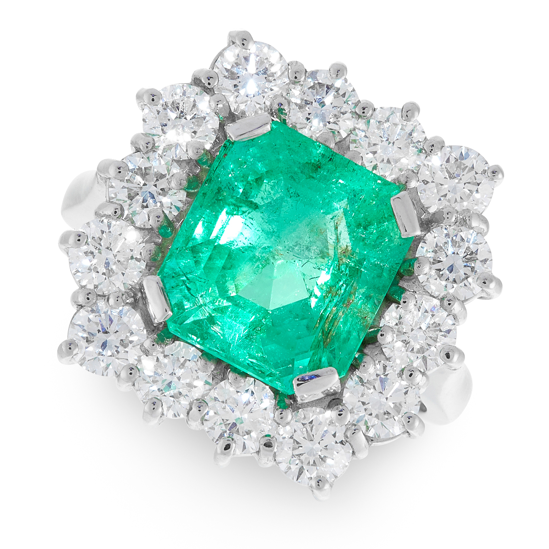 A COLOMBIAN EMERALD AND DIAMOND RING in platinum, set with a central emerald cut emerald of 6.16