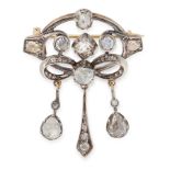 AN ANTIQUE DIAMOND BROOCH, CIRCA 1900 in yellow gold and silver, the scrolling body with central bow