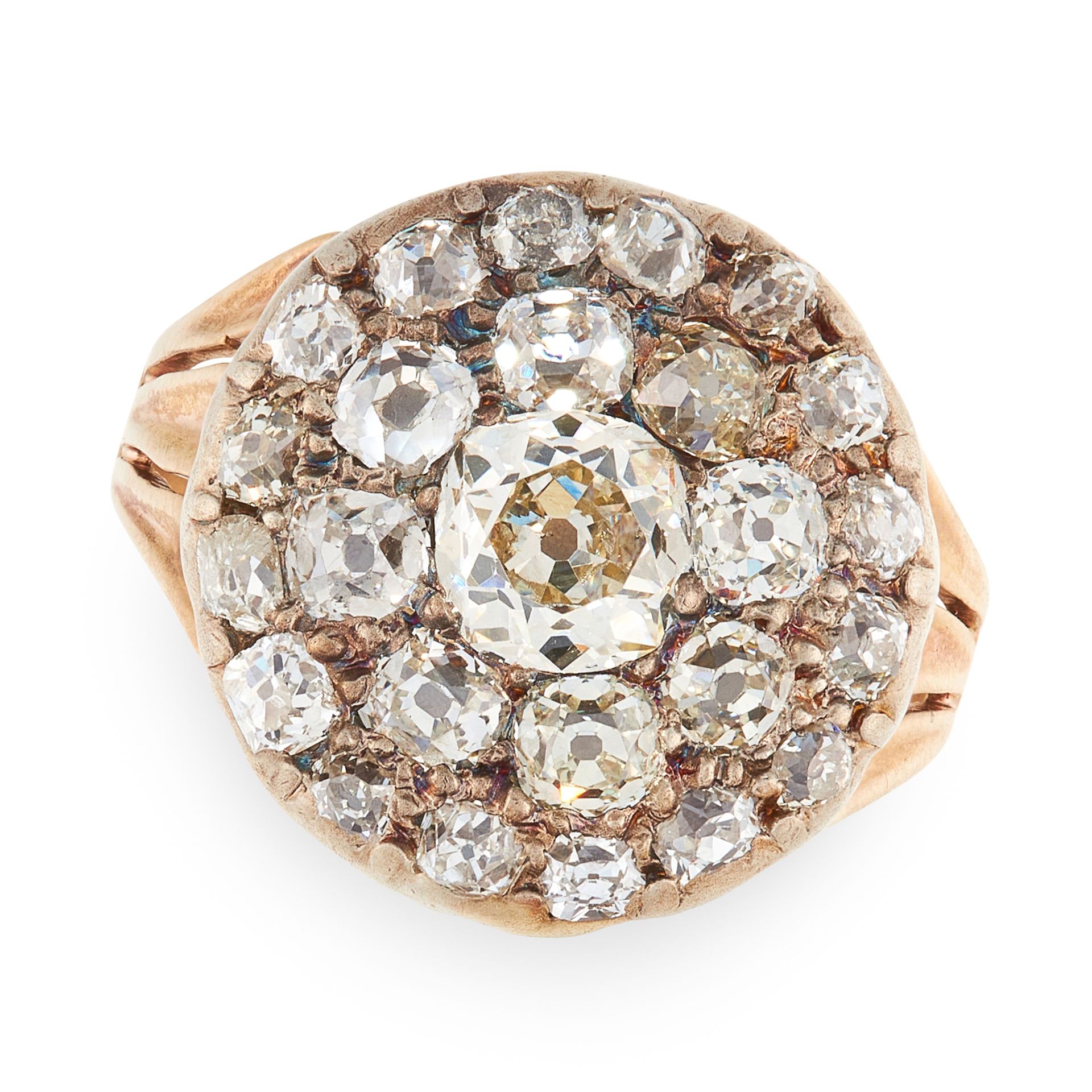 AN ANTIQUE DIAMOND CLUSTER RING, 19TH CENTURY in yellow gold and silver, the circular face set