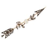 AN ANTIQUE DIAMOND AND PEARL ARROW BROOCH in yellow gold and silver, designed as an arrow, the