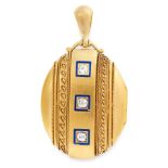 AN ANTIQUE DIAMOND AND ENAMEL MOURNING LOCKET PENDANT in high carat yellow gold, the oval hinged