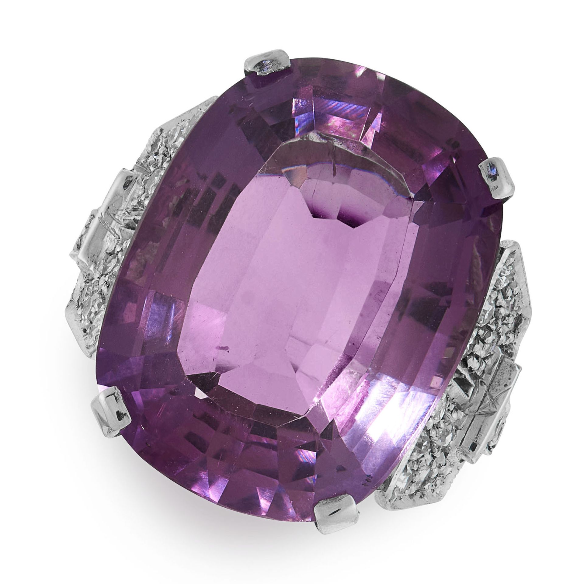 AN AMETHYST AND DIAMOND DRESS RING in 18ct white gold, set with a cushion cut amethyst of 16.59