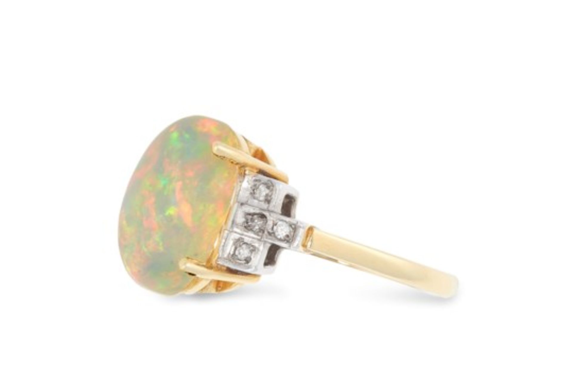 AN OPAL AND DIAMOND DRESS RINGin 18ct yellow gold, set with an oval cabochon opal of 5.08 carats - Bild 2 aus 2